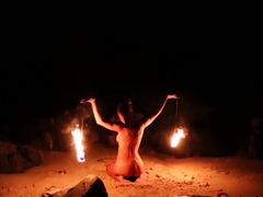 Mysterious milf gives amazing fire dancing performance
