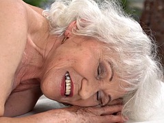 Mature granny gets a facial after sucking