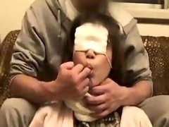 Asian chick is wearing a mask and he tears it open for a bl